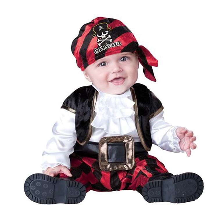Baby in a pirate costume with a red and black bandana on a white background